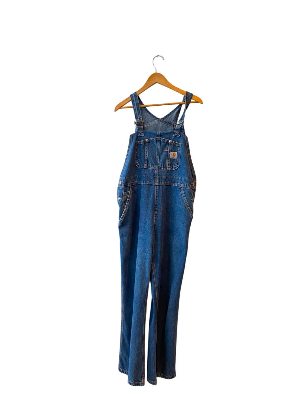 A vintage blue denim Carhartt overalls