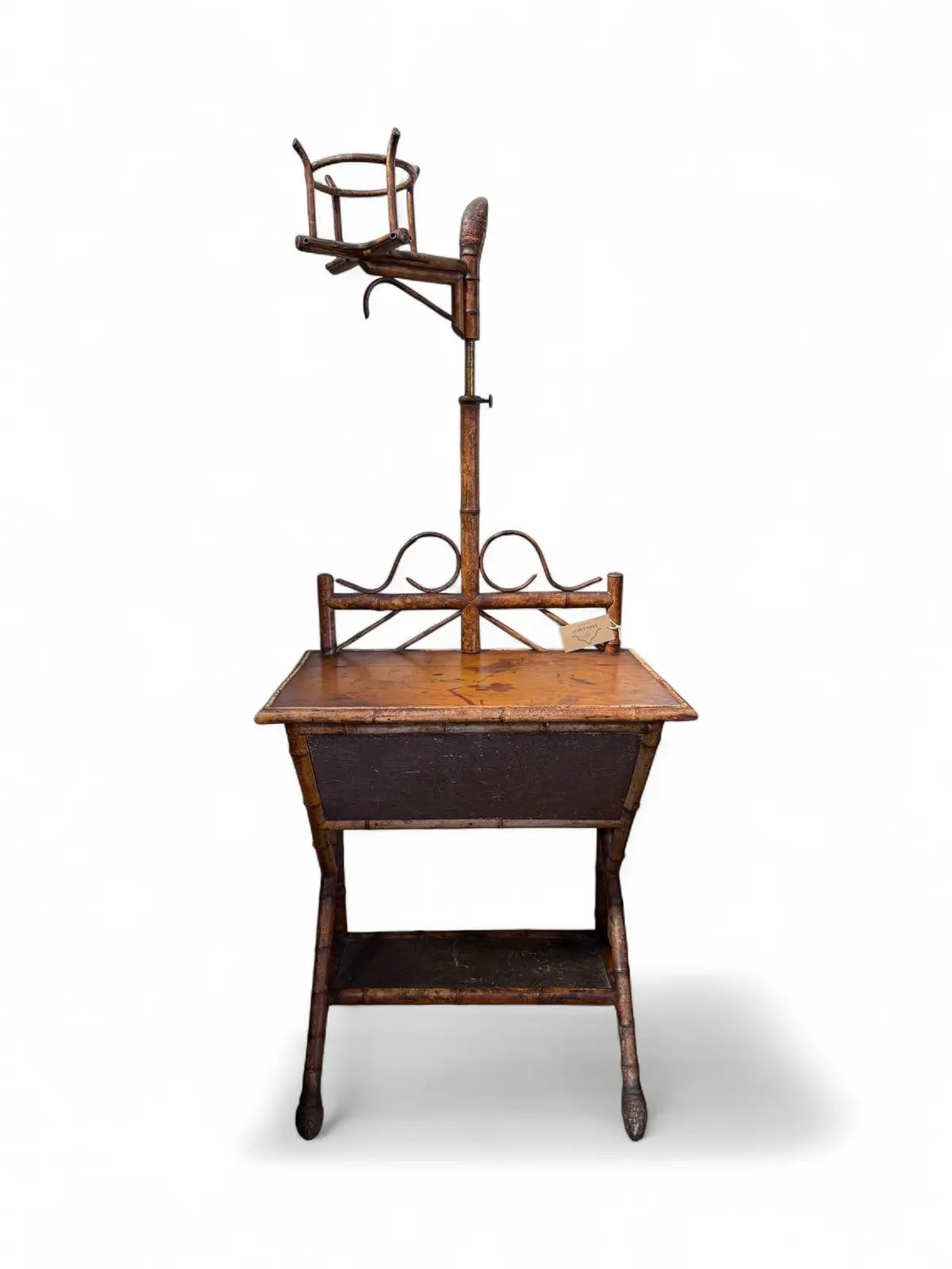 Antique bamboo washstand with adjustable pot holder.